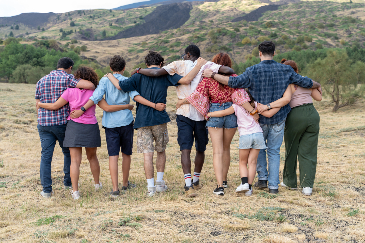 Vistacreate 759037272 stock photo generation friends showing unity inclusion nature rear view diverse community