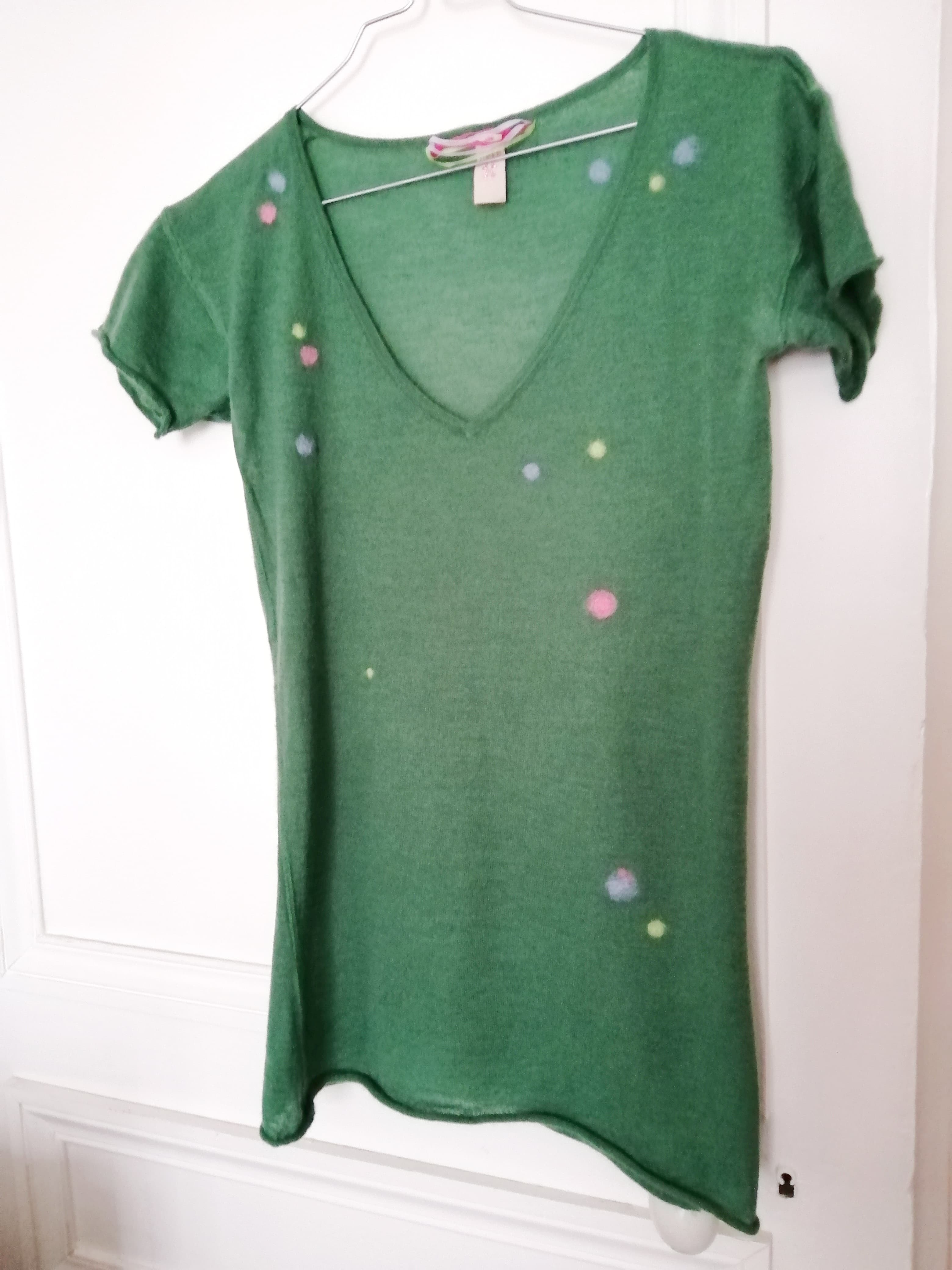 Pull troue par les mites apres l operation