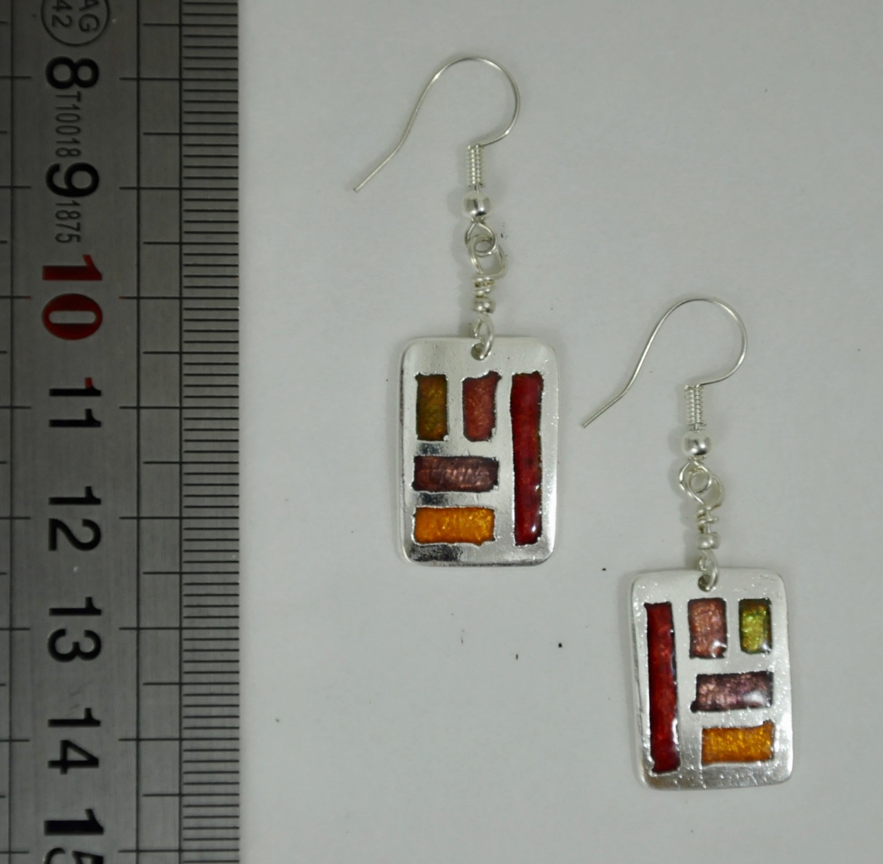 Boucles-me-tal-care-e-rouge-2