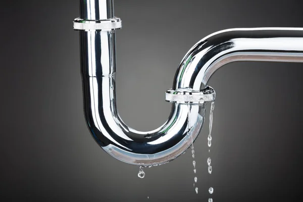 Depositphotos 149686868-stock-photo-leakage-of-water-from-pipe-1-