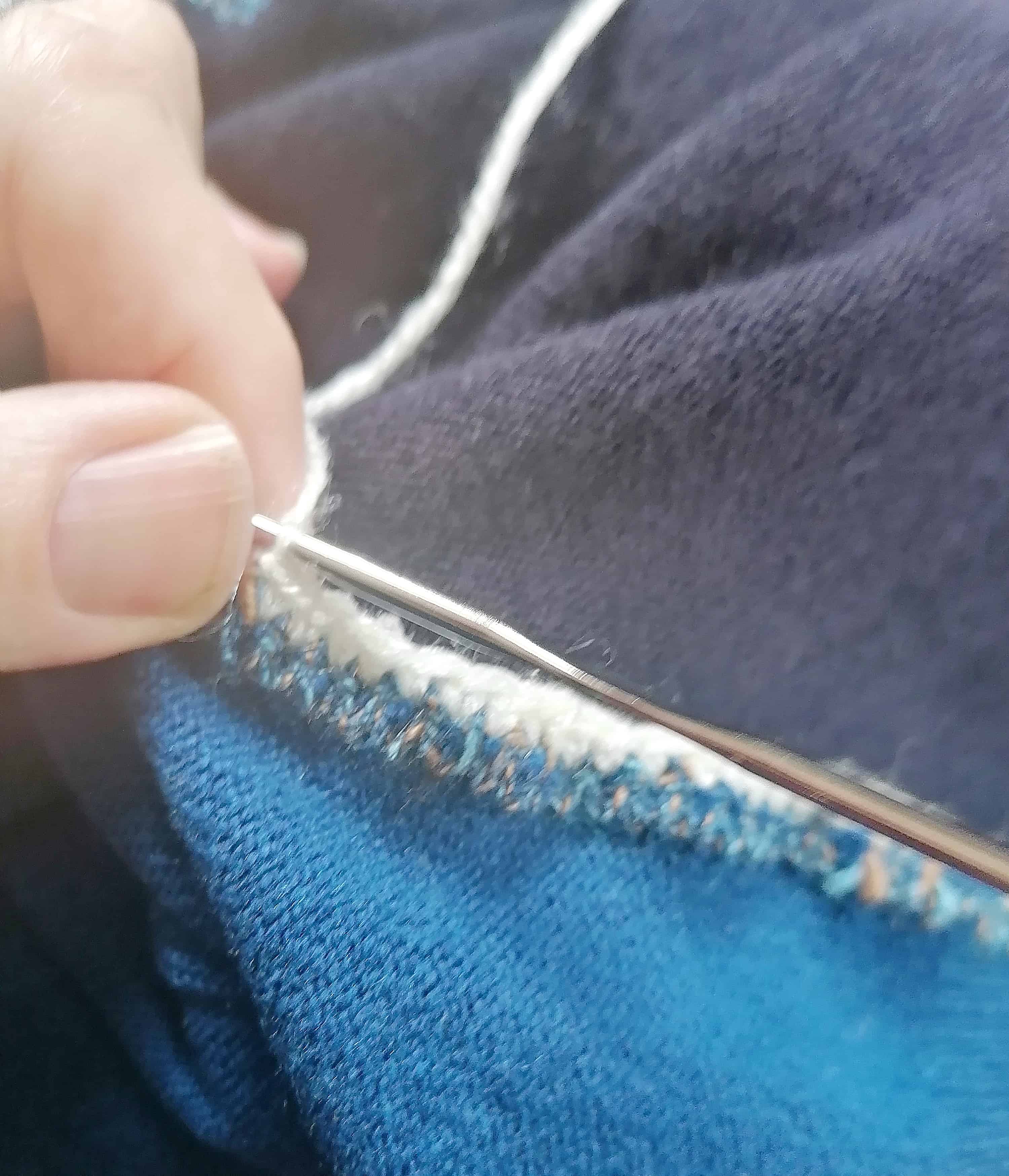 Reparer un pull